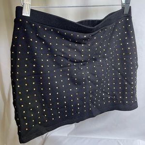 Black mini skirt with gold embellishments
